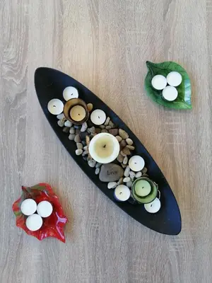 a black plate with mushrooms and beans on a table at Spacious & Modern Studio Apartment Near the Airport in Glyka Nera