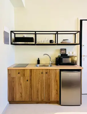 a kitchen with a sink and a microwave at ATHENS STORIES in Athens