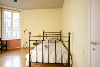 a bedroom with a bed in a room at House at the Foothills of Acropolis in Athens