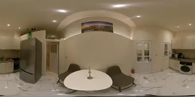 a kitchen with a table and chairs in a room at ATHENS City Center Historical Area in Athens