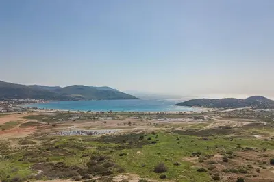 a view of the ocean from the top of a hill at Light-filled home with Garden near Beach in Anavissos