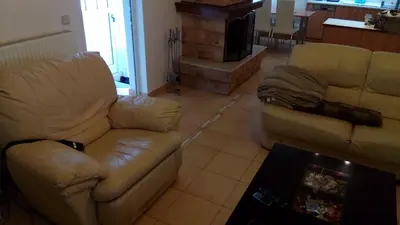 a living room with two couches and a couch at Luxury Apartment in Ano Glyfada in Athens