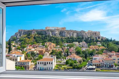 a view ofhens from a window of a city at Mythos Luxury Suites in Athens