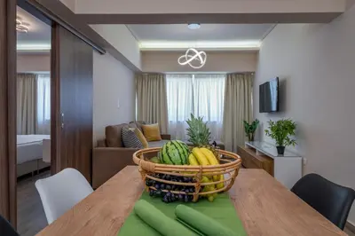 a basket of fruit on a table in a living room at Amazing Apartments @ Aiolou Str. in Athens