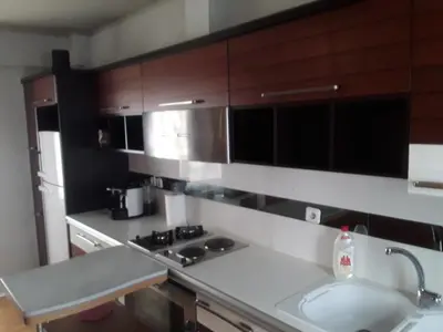 a kitchen with a sink and a counter top at Deluxe Apartment Best Point in Athens