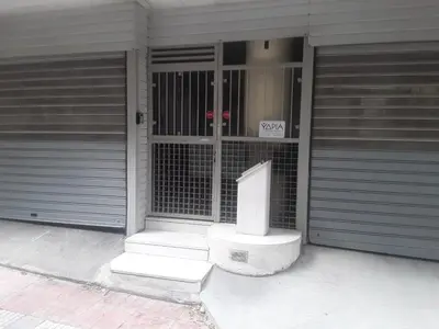 a front door of a house with a sign on it at Deluxe Apartment Best Point in Athens
