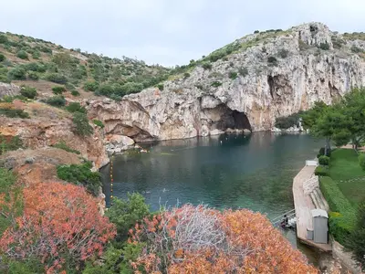 a view of a river with a mountain in the background at Family getaway, spacious and luxurious, sea view, terrace, 5 minutes from Voula beach, 30min from Athens center in Athens