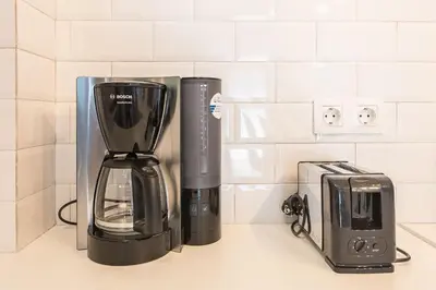 a blender and a toaster on a kitchen counter at 3 mins walking from Acropolis in Athens