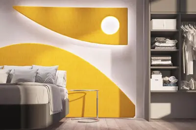 a bedroom with a bed and a yellow wall at Athens Utopia Ermou in Athens