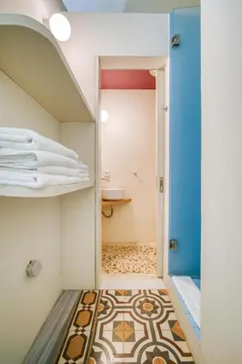a room with a bathroom with a toilet and a sink at KERAMOS Athens in Athens