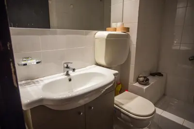 a bathroom with a sink and a toilet at ACROPOLITANA 2 in Athens