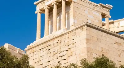 a building with columns on top of it at ACROPOLITANA 2 in Athens
