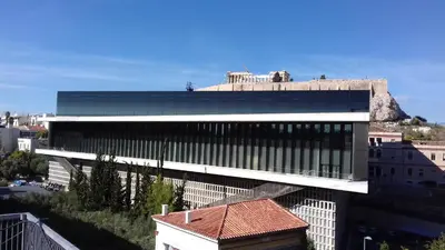 a large building with many windows in a city at ACROPOLITANA 2 in Athens