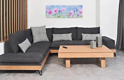 a couch and a coffee table in a living room at BEAUTIFUL PEOPLE SUITES ATHENS ACROPOLIS VIEW in Athens