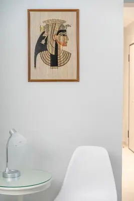 a room with a table and a picture on the wall at Leo's home in Athens