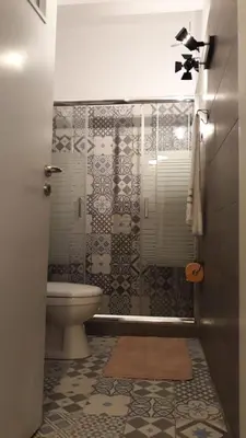 a bathroom with a toilet and a shower at Kanigos 3 BR VIEW Center of Athens in Athens