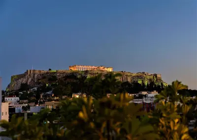 a castle on top of a mountain with buildings at Acropolis Eye Loft in Athens