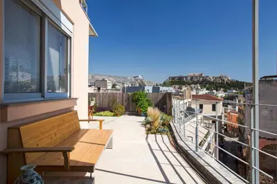 a balcony with a bench and a view of the city at Impressive Apartment with Amazing Views - MK1 in Athens