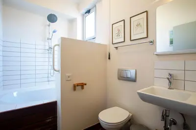 a bathroom with a toilet and a sink and a tub at Impressive Apartment with Amazing Views - MK1 in Athens