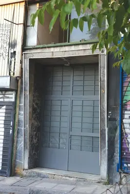 a garage door is open on a building at Impressive Apartment with Amazing Views - MK1 in Athens