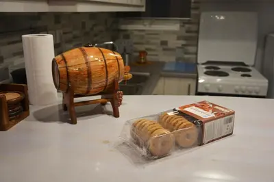 a loaf of bread in a box on a kitchen counter at Vintage, spacious apartment in the heart of Athens! in Athens
