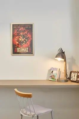 a desk with a chair and a picture on a shelf at Enjoy Athens from a funky studio near Acropolis! in Athens