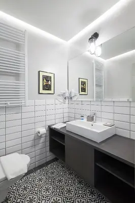 a white bathroom with a sink and a mirror at Walk through Athens from 1-bdr next to Acropolis! in Athens