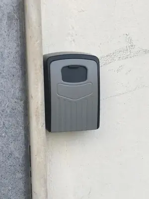a black box on the side of a wall at Koukaki Olympiou Apartment in Athens