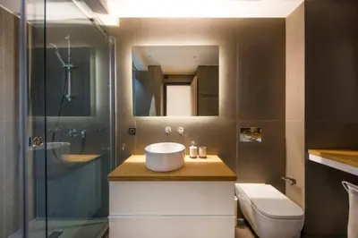 a bathroom with a sink and a shower and a toilet at Downtown Syntagma apartment 3 in Athens