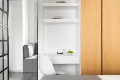 a bedroom with a white desk and a white chair at Athens View Loft 07 & 08 in Athens