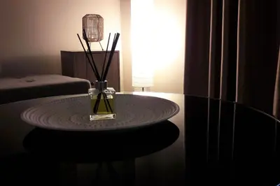 a room with a table with a vase on it at Anna's Relaxing Dreamhouse in Athens