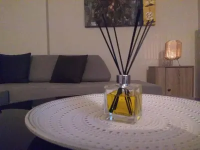 a table with a vase on top of a table at Anna's Relaxing Dreamhouse in Athens