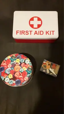 a first aid kit and a plate on a table at Alexandra's path in Athens