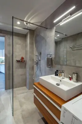 a bathroom with a white sink and a shower at THE apartment 2 BDRS/2 BATHS luxury residence in Athens