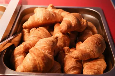 a metal container filled with croissants in at Athens Starlight Hotel in Athens