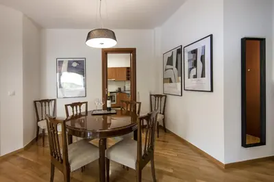a dining room with a table and chairs at 2 bedroom flat next to Acropolis in Athens