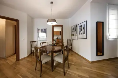 a dining room with a table and chairs at 2 bedroom flat next to Acropolis in Athens
