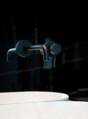 a close up of a sink with a faucet at PINACOTA SUITES ATHENS in Athens