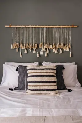 a bedroom with a bed with a bunch of pillows at Delightful 1BD Apartment in Plaka by UPSTREET in Athens