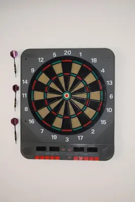 a dart board with a dart boardigun at METROPOLITAN MACVIEW Διαμέρισμα in Piraeus