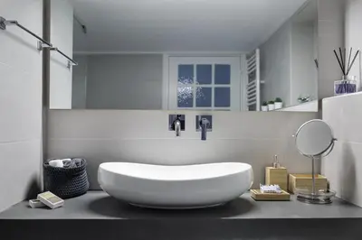 a bathroom with a large white tub on a counter at The Gem of Filopappou in Athens
