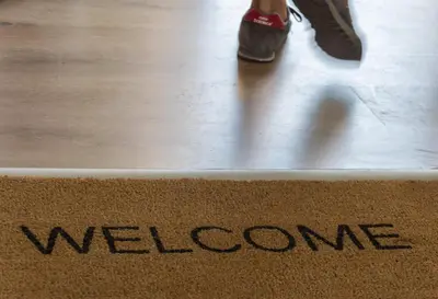 a welcome mat with the word welcome on the floor at Elegance in Athens in Athens