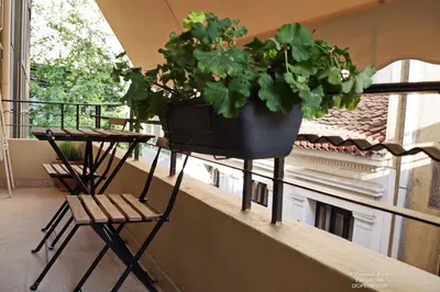 a plant in a pot on a balcony at Athens Historic Centre Renovated Apartments in Athens