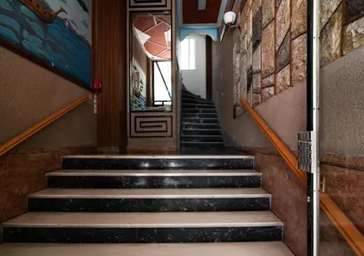a stairway with steps leading up to a door at Pame Rentals - Charming Central Studio in Athens