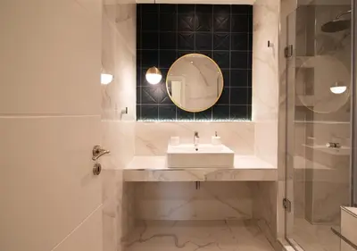 a bathroom with a sink and a mirror at Pame Rentals - Charming Central Studio in Athens