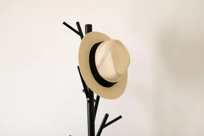 a hat on top of a black pole at Classy and stylish apartment next to Hilton in Athens