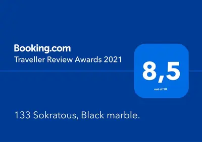 a screenshot of a black market with the words traveler review awards at 133 Sokratous, Black marble. in Athens