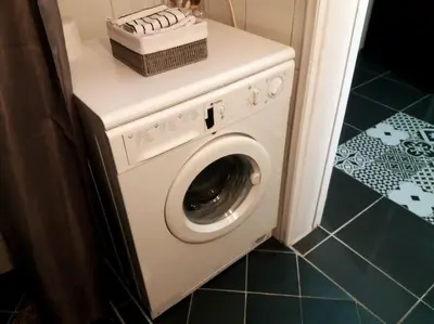 a washing machine with a basket on top of it at Modern flat in city center in Athens