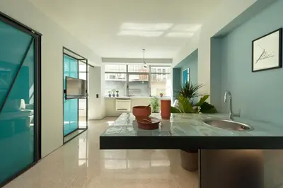 a large bathroom with a sink and a kitchen at Arcade Project Hi-end Apartments in Athens
