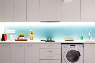 a white kitchen with a washing machine in it at Cute and Convenient Studio in Athens Center in Athens
